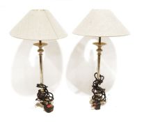 Pair of silver coloured metal table lamps with cream shades, modern