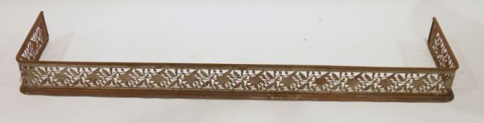 Copper fire curb, 15cm x 36cm and a cast iron fire curb with pierced floral decoration, 50cm x