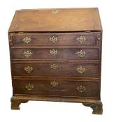 Georgian mahogany bureau, the fall front enclosing fitted interior with central cupboard,