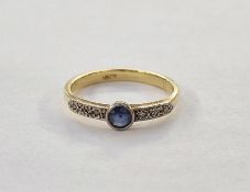18ct gold, sapphire and diamond ring, the circular collet set sapphire flanked by small diamonds