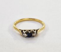 18ct gold, diamond and sapphire three-stone ring set central sapphire and two small diamonds, claw