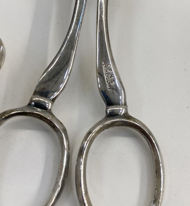 Assorted silver-plated items to include cruet set, sugar tongs, sugar shaker, jam spoons, dessert - Image 7 of 8