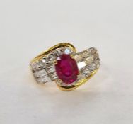 Gold metal, ruby and diamond set ring, set oval ruby, flanked by 12 baguette diamonds and twelve