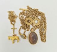 Miniature gold-coloured charm of a donkey, indistinctly marked, a gold-coloured chain, a rolled gold