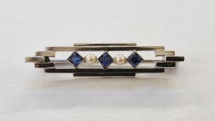 9ct white gold, sapphire and pearl Art Deco-style brooch, angular, having three square sapphires and
