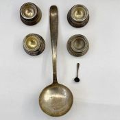 A set of four French silver circular egg cups with clear glass liners, each one 1ozt approx. and a