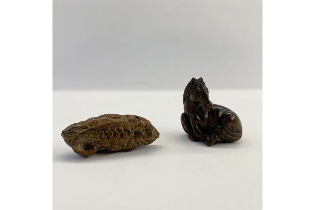 Japanese carved wood netsuke in the form of a seated foal, 4cm high and another in the form of a - Image 1 of 5