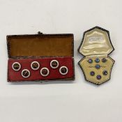 Set of early 20th century striped agate buttons with a cream and gilt patterned surround, boxed, and