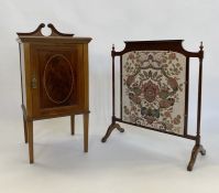 Edwardian inlaid mahogany pot cupboard having double swan neck pediment, framed panel door, all with