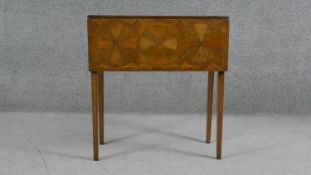 A Georgian drop flap table parquetry inlaid in various specimen timbers fitted with frieze drawer