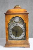 A modern 18th century style walnut cased bracket clock, the dial inscribed 'Tempus Fugit', with