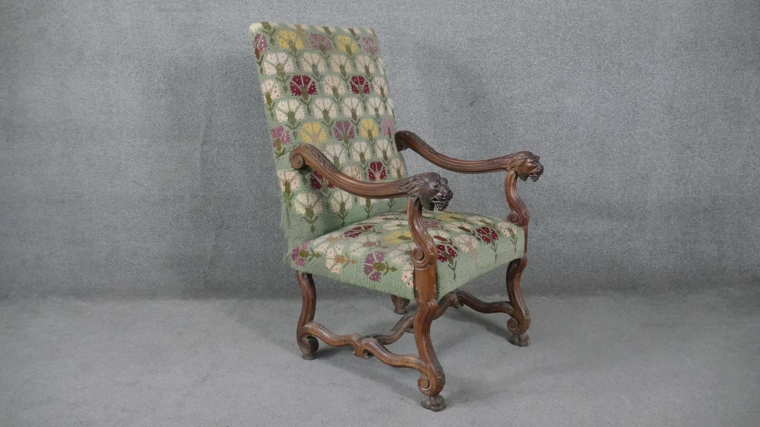 A 19th century Continental walnut armchair in stylised floral tapestry upholstery and lion carved - Image 2 of 7