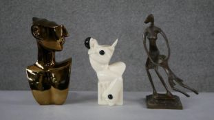 An Art Deco ceramic minstrel vase, a bronze effect moulded figure of a mother swinging her child and