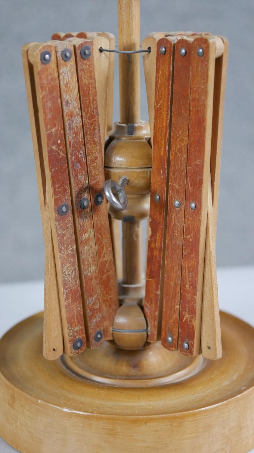 A 19th century treen wool spinner with four extending arms and a turned circular base. H.23 W. - Image 4 of 5