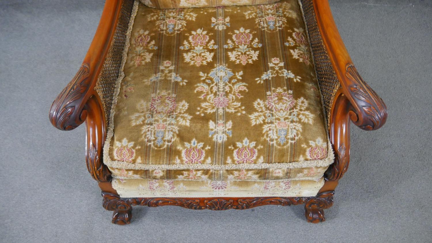 A pair of mid century carved walnut bergere armchairs with double caned sides in cut floral - Image 5 of 9