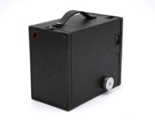 A vintage brownie camera with its brown leather case. H.12 W.17 D.19cm