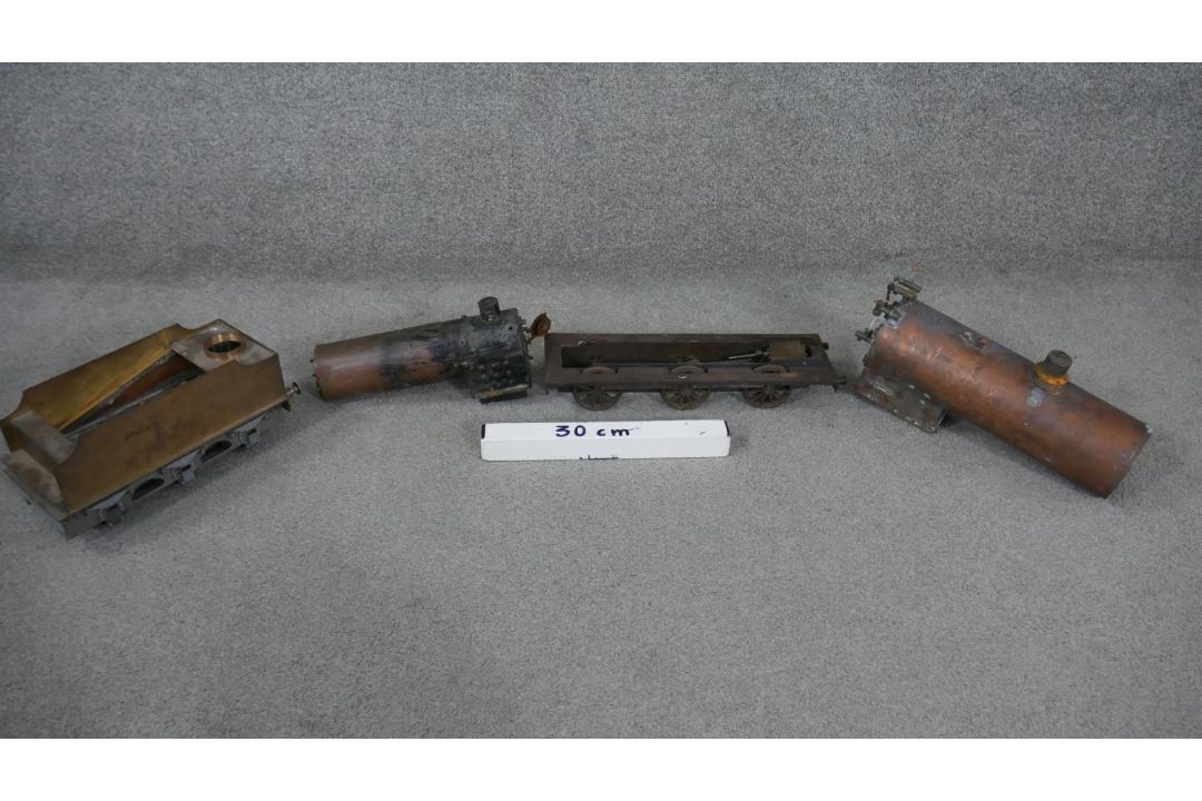 Four handmade copper and iron model steam locomotive parts. Including two boilers, a wagon and - Image 7 of 8