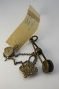 Two 19th century skirt lifters. One stamped Delphine, DRP138502 silver plate with a grape and