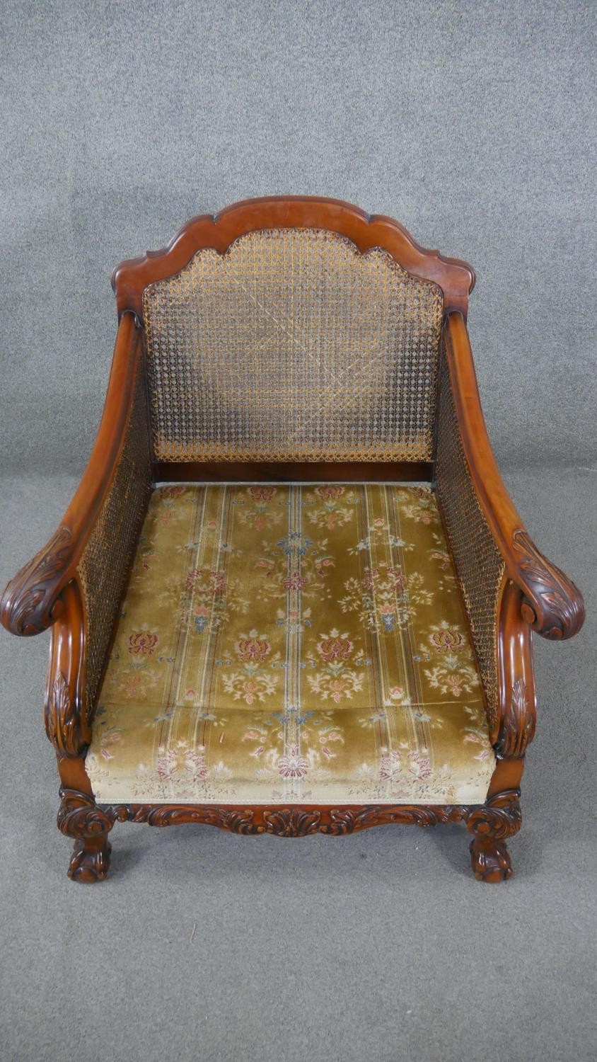 A pair of mid century carved walnut bergere armchairs with double caned sides in cut floral - Image 7 of 9