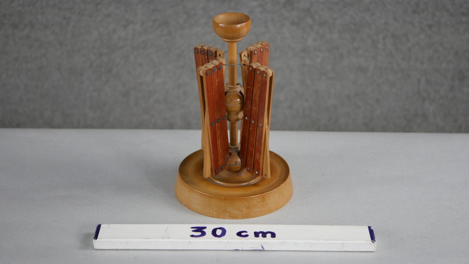 A 19th century treen wool spinner with four extending arms and a turned circular base. H.23 W. - Image 5 of 5