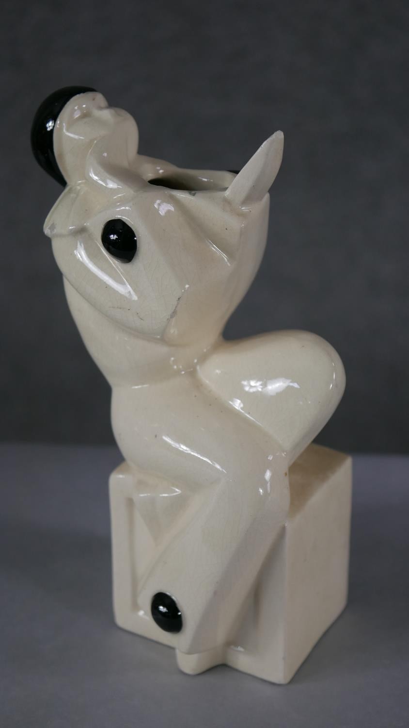 An Art Deco ceramic minstrel vase, a bronze effect moulded figure of a mother swinging her child and - Image 2 of 4