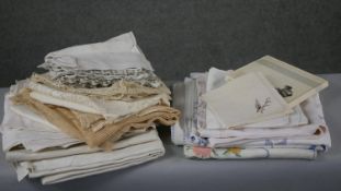 A large collection of 19th and early 20th century hand embroidered linen and lace. Including table