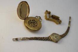 A collection of gold plated item. Including a mother of pearl dial vintage ladies automatic cocktail