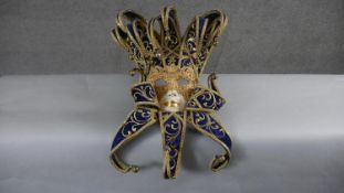 A Atelier Marega Venetian fabric and ceramic jester mask. Makers label to the inside. H.66 W.27cm