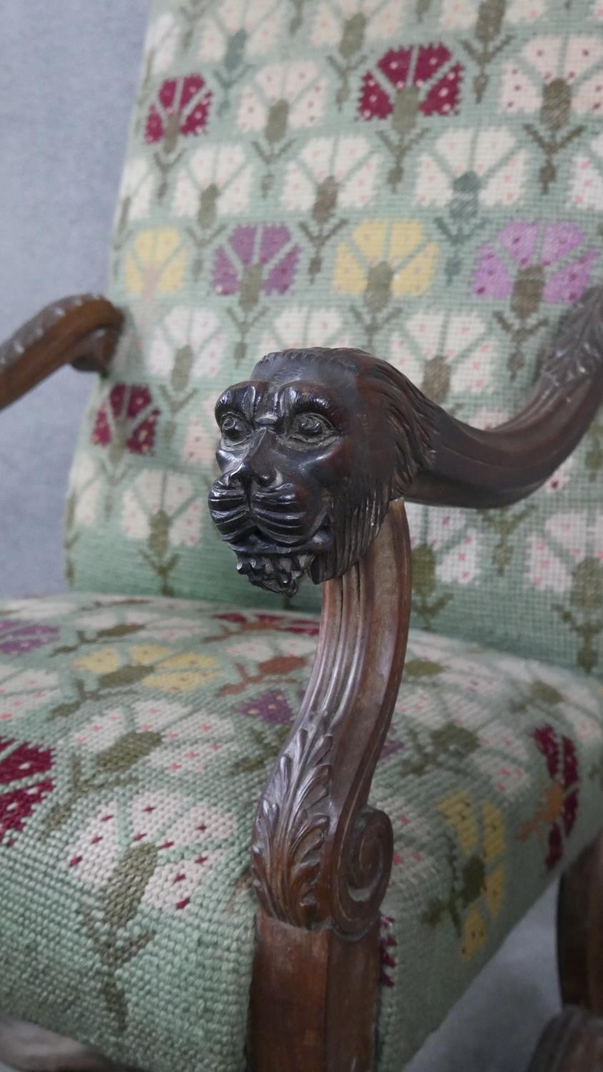 A 19th century Continental walnut armchair in stylised floral tapestry upholstery and lion carved - Image 6 of 7