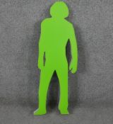 A neon green and white acrylic light in the form of a figure. H.73 W.22 D.4cm