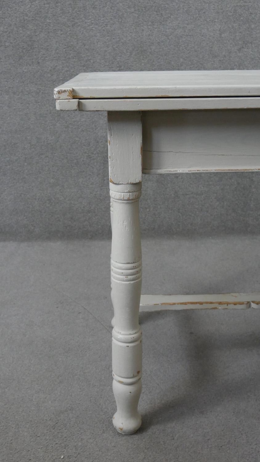 A 19th century painted pine fold over top dining table. H.80 W.100 D.66cm (not extended) - Image 7 of 8