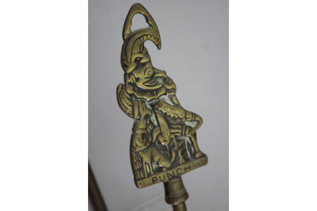 A framed painted plastic tile effect picture of Punch and Judy along with two horse brasses and fire - Image 6 of 9