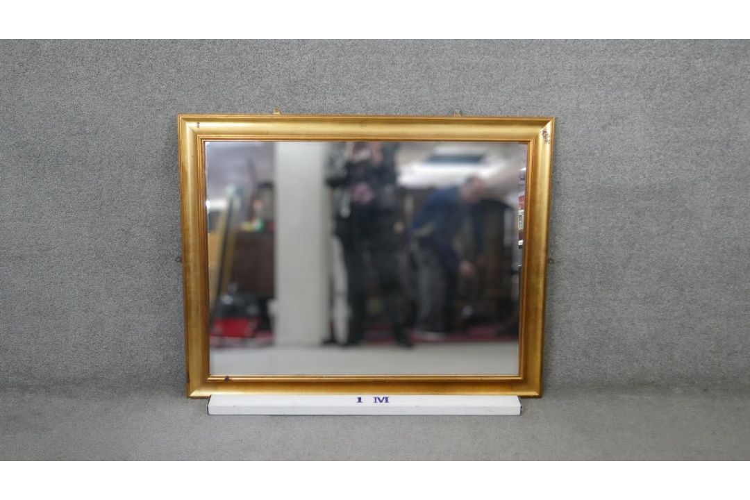 A wall mirror in moulded gilt frame. H.93 W.118 cm - Image 4 of 4