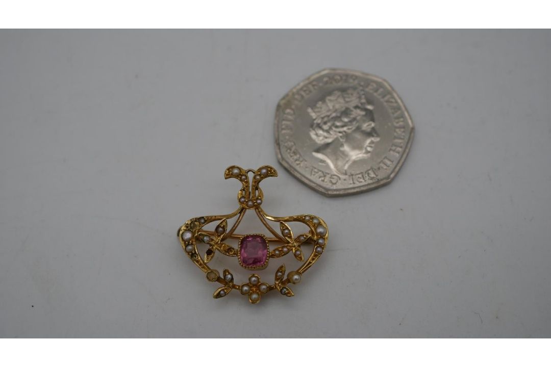 A Victorian yellow metal (tested 15 carat) seed pearl and pink stone brooch/pendant. Set with thirty - Image 2 of 7