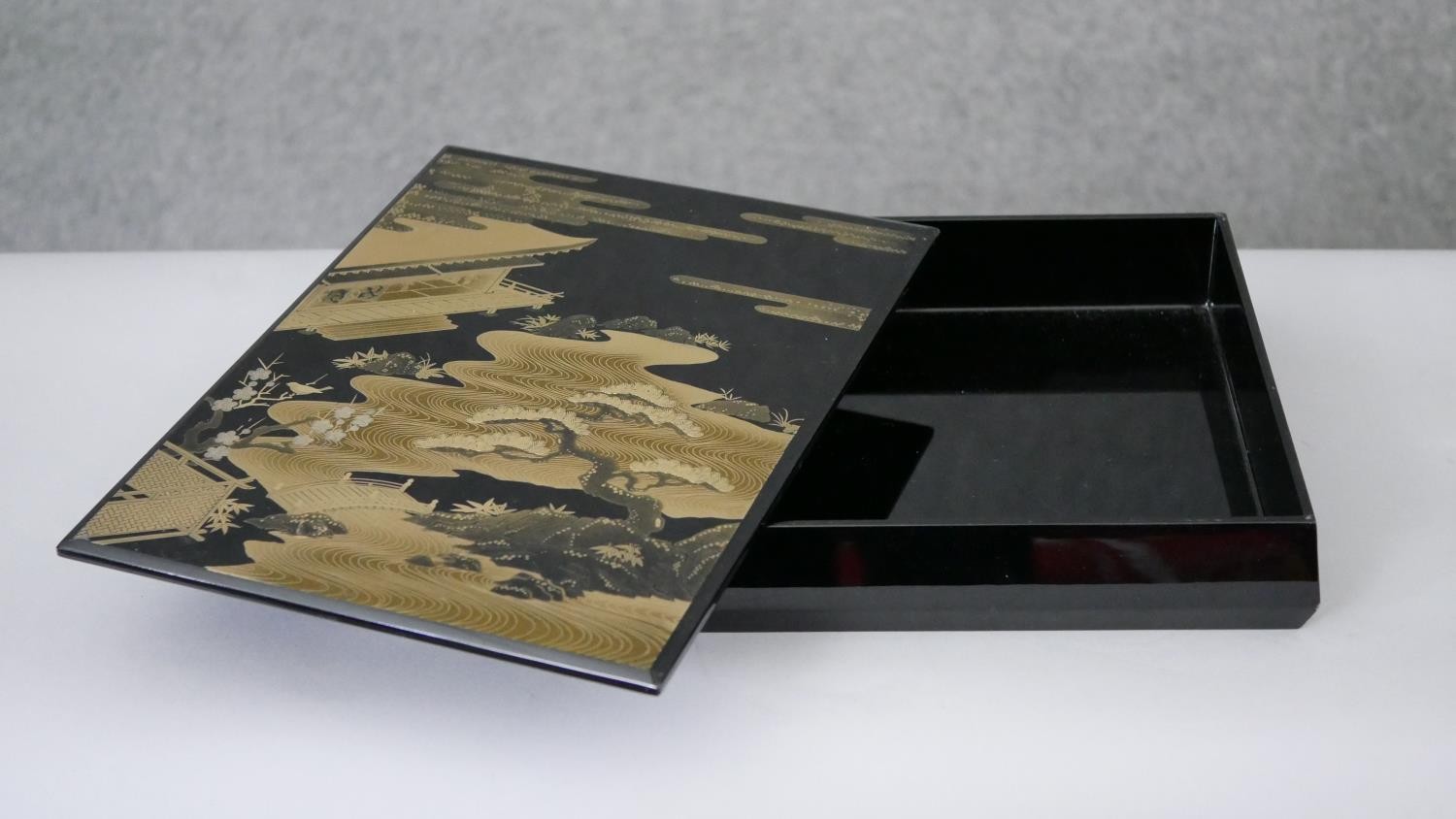 Two Japanese gilded lacquered boxes. One a tea caddy with partitions decorated with a village - Image 8 of 8