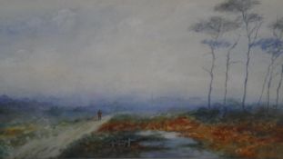 A 19th century framed and glazed watercolour, figure on a path, unsigned. H.39 W.55cm