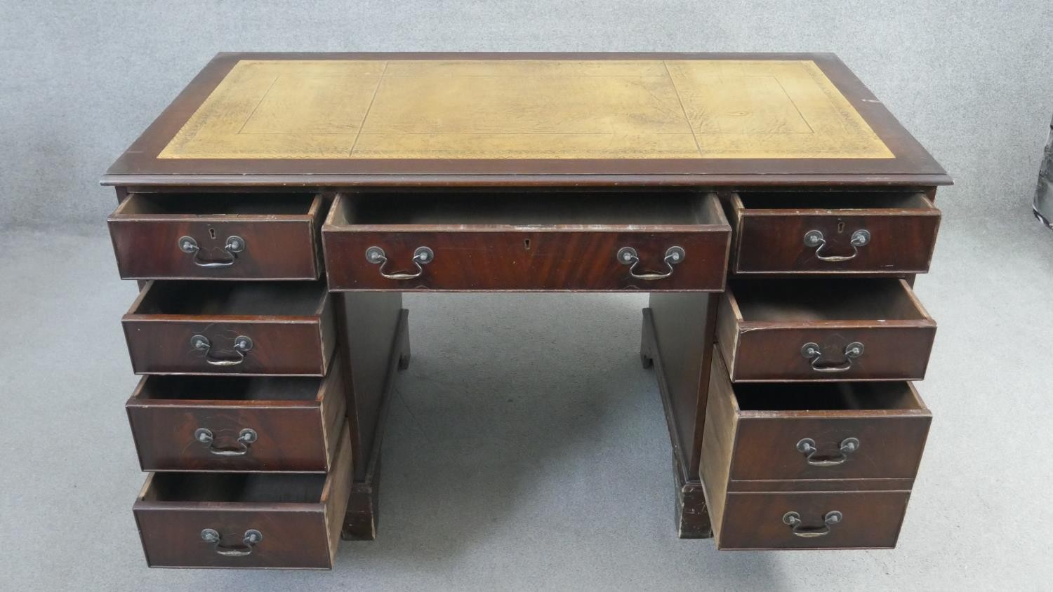 A Georgian style mahogany pedestal desk with inset tooled leather top on bracket feet. H.75 W.136 - Image 2 of 6