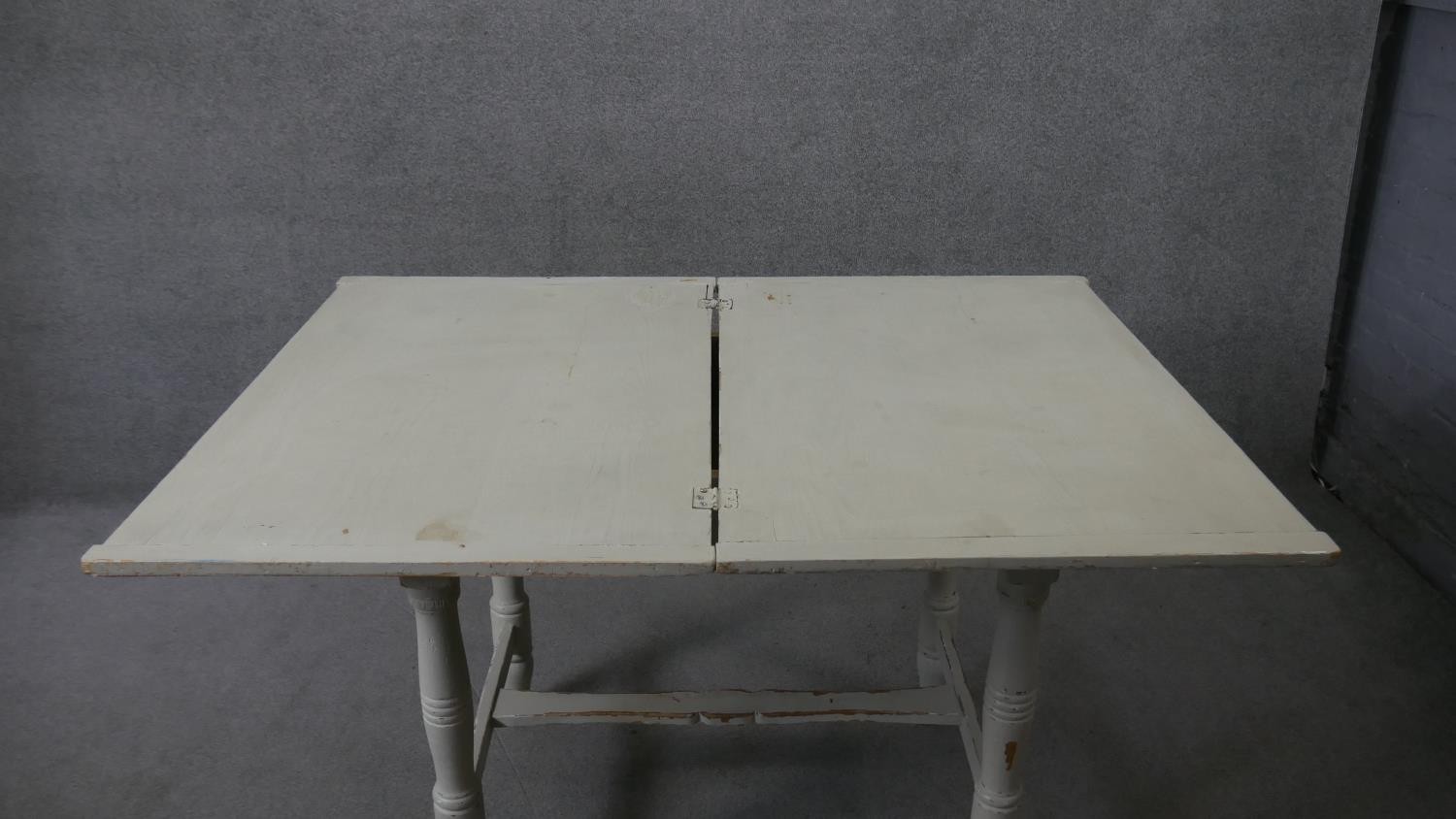 A 19th century painted pine fold over top dining table. H.80 W.100 D.66cm (not extended) - Image 5 of 8