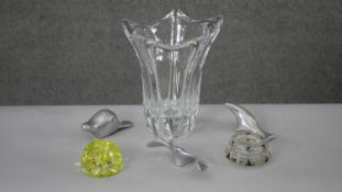 A collection of glass and other items. Including a large Daum crystal floral shaped vase, signed