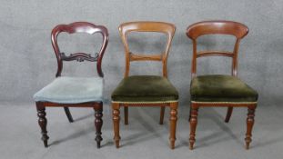 A miscellaneous collection of three Victorian mahogany dining chairs.