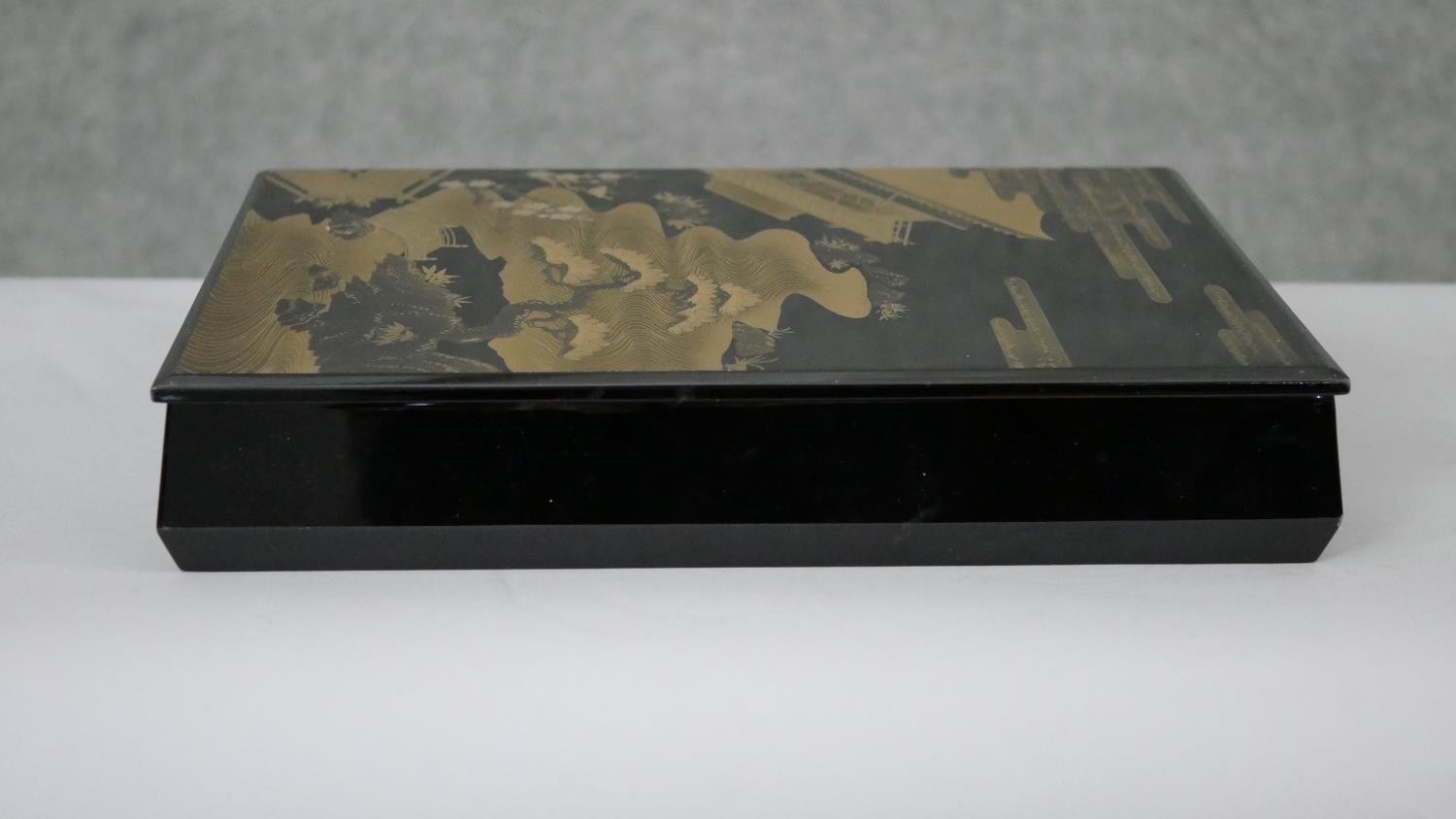 Two Japanese gilded lacquered boxes. One a tea caddy with partitions decorated with a village - Image 7 of 8
