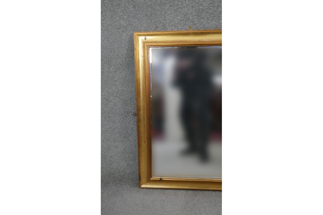 A wall mirror in moulded gilt frame. H.93 W.118 cm - Image 2 of 4
