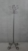 A vintage wrought iron scrolling hall coat stand. H.73 W.60 D.60 cm