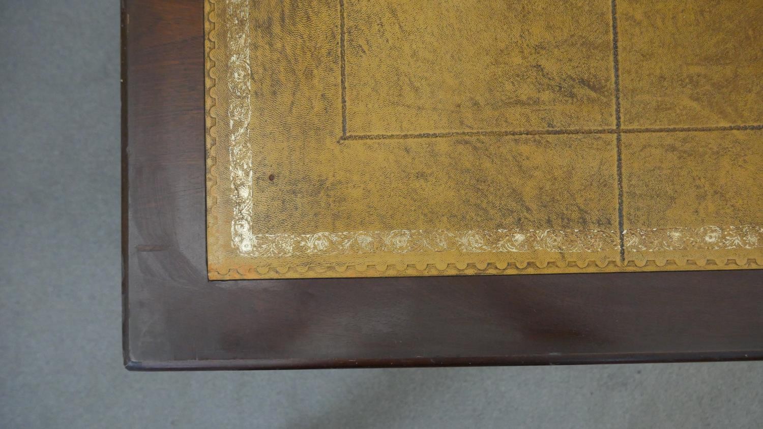 A Georgian style mahogany pedestal desk with inset tooled leather top on bracket feet. H.75 W.136 - Image 5 of 6