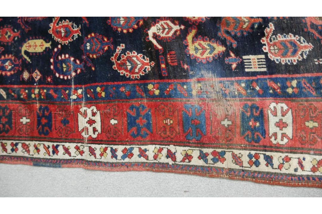 A large Kurdish runner with repeating motifs across the midnight ground within stylised multiple - Image 3 of 5