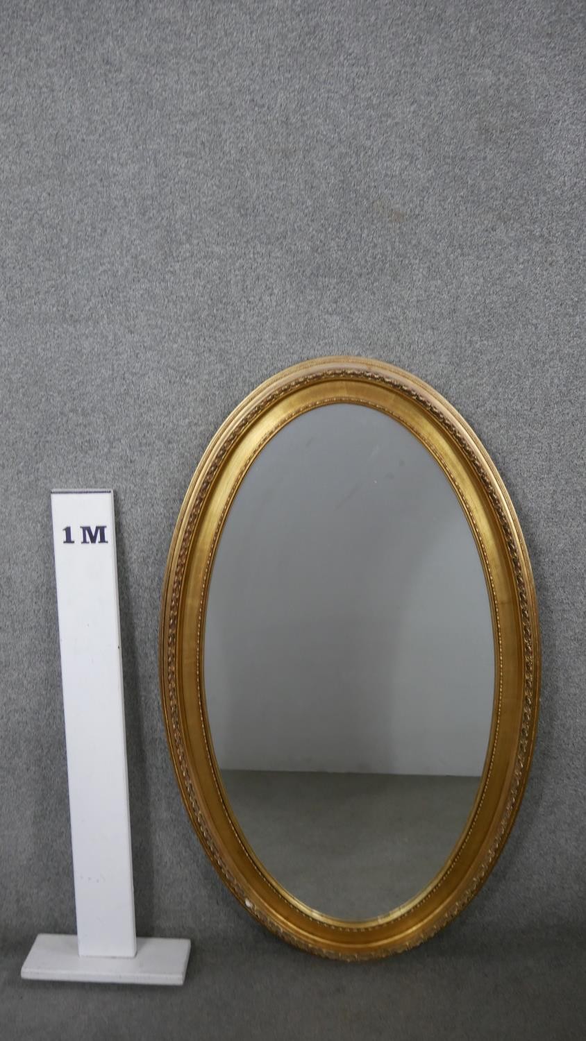 A large 20th century gilt framed wall mirror with beaded detailing. H.126 W.75cm - Image 3 of 4