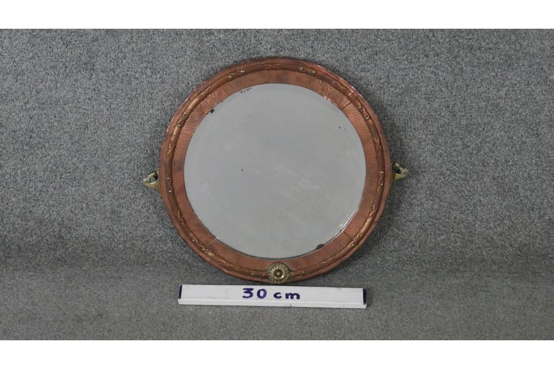 A C.1900 copper and brass hammered wall mirror with bevelled plate. H.37 W.42cm - Image 2 of 6