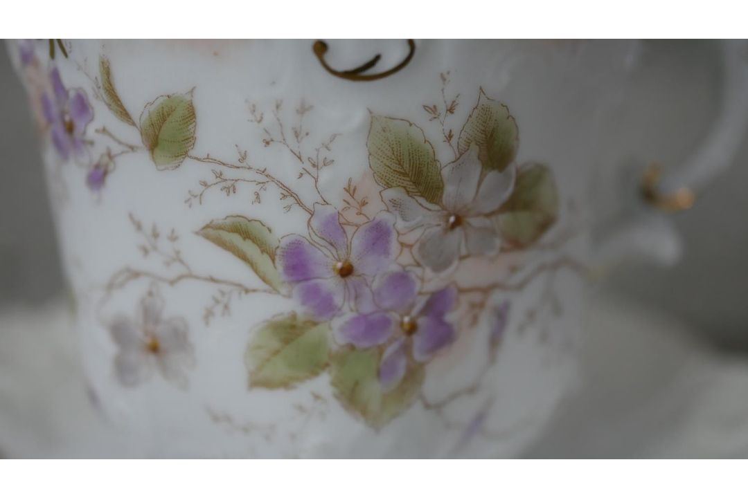 A Victorian hand painted fine china ten person part coffee set. Decorated with violets and gilded - Image 8 of 14