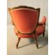 A late 19th century carved mahogany armchair in geometric floral upholstery on fluted tapering - Image 3 of 4