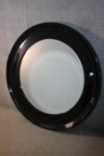 Wall mirror, contemporary with lacquered finish. Dia. 120 cm.